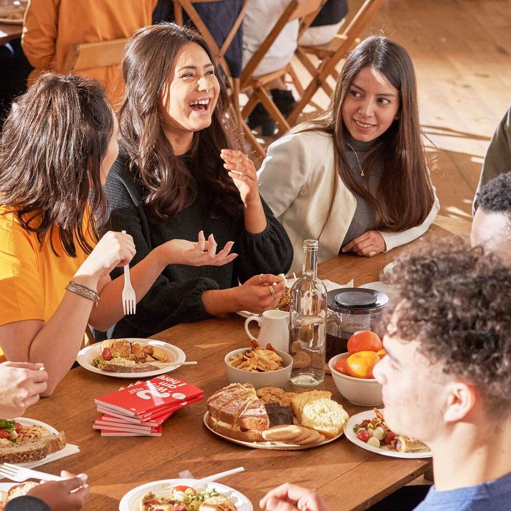 An Alpha group sharing a meal together