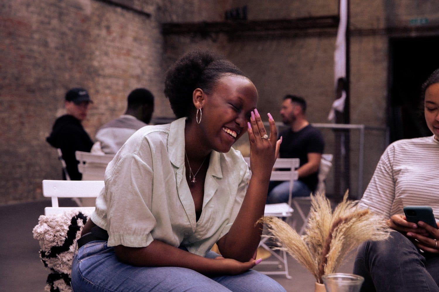 Laughing together at Alpha