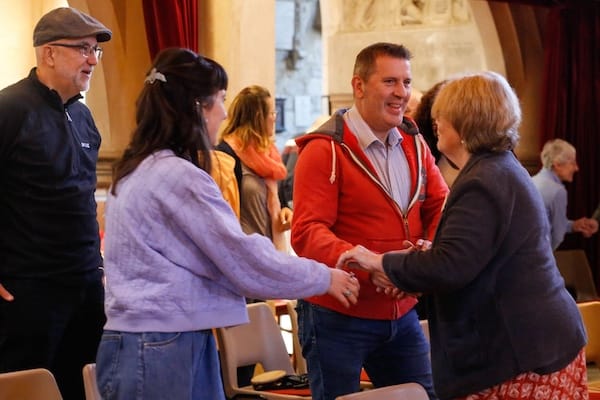 Members of St Mary's greeting each other on a Sunday